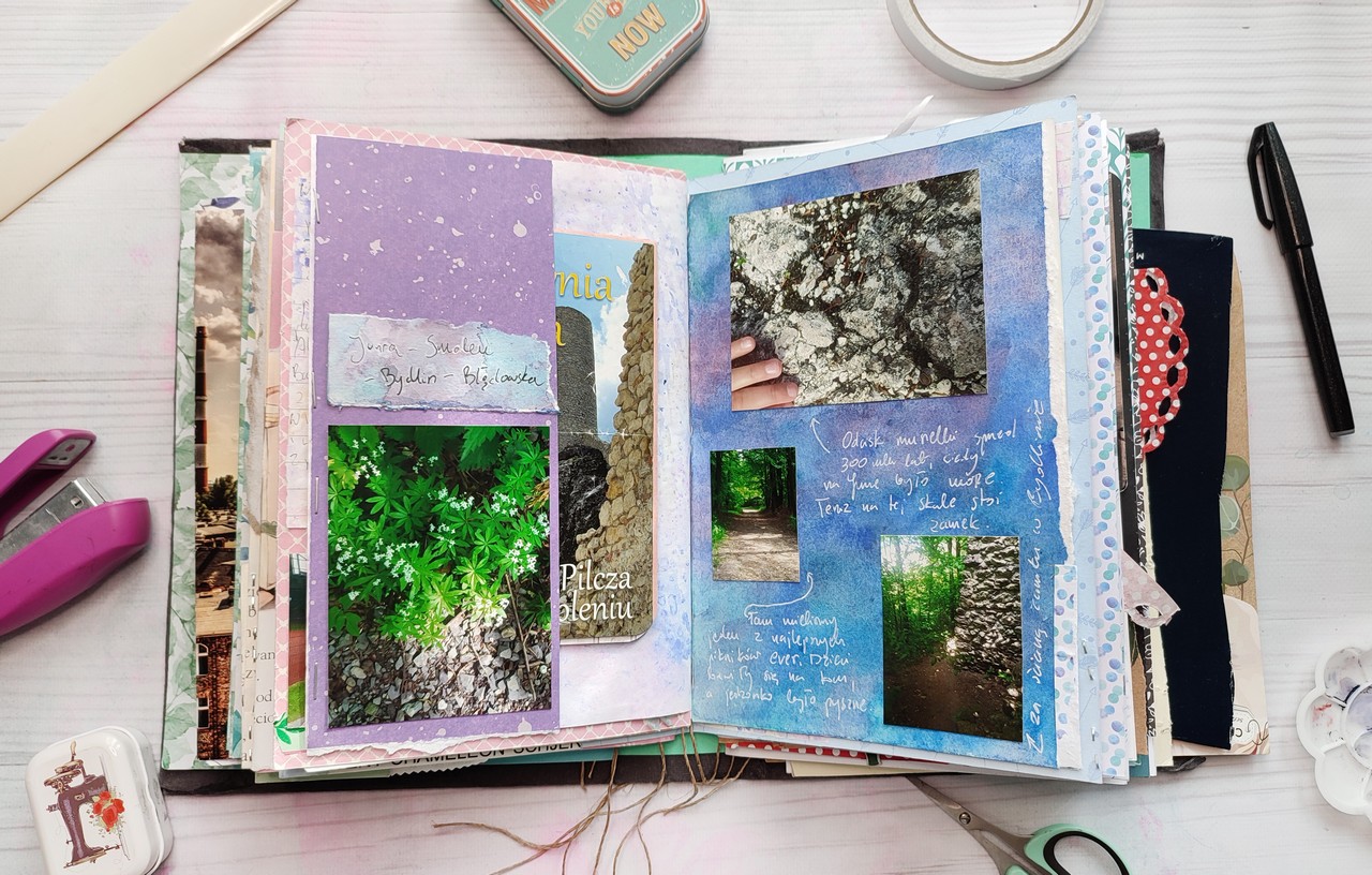 View of a junk journal spread: jury photos and a white pen.